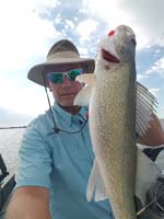 Mark Fowler keeper walleye at Cheney