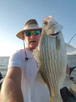 Mark Fowler with wiper caught at Cheney Reservoir